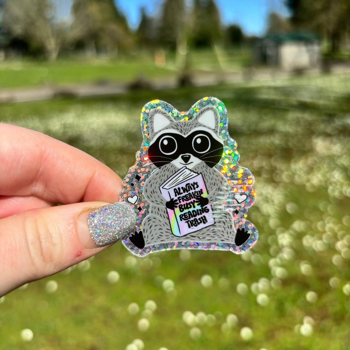 Always Reading Trash Raccoon Glitter Sticker - Awfullynerdy.co