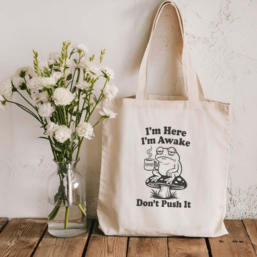 I'm Here I'm Awake Don't Push It Sublimated Canvas Tote Bag - Awfullynerdy.co