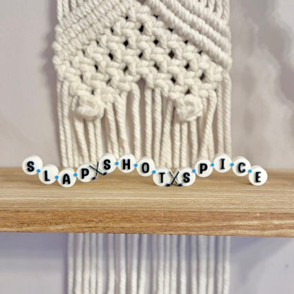 3d Printed Shelf Friendship Bracelet Sign - "Slap Shot Spice" - Awfullynerdy.co