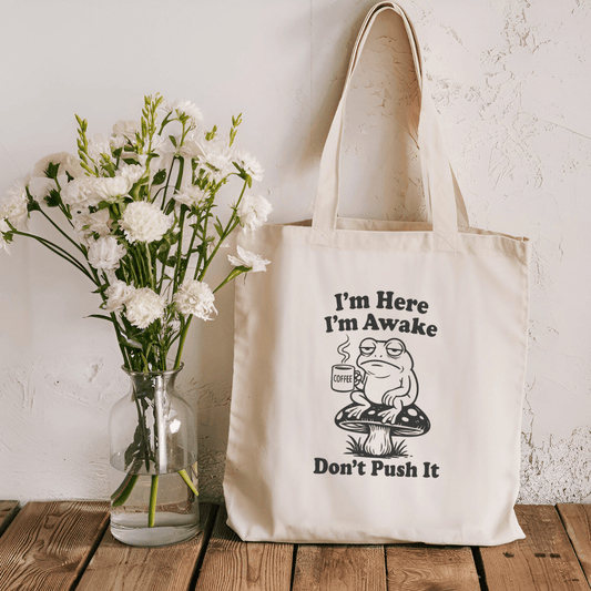 I'm Here I'm Awake Don't Push It Sublimated Canvas Tote Bag - Awfullynerdy.co