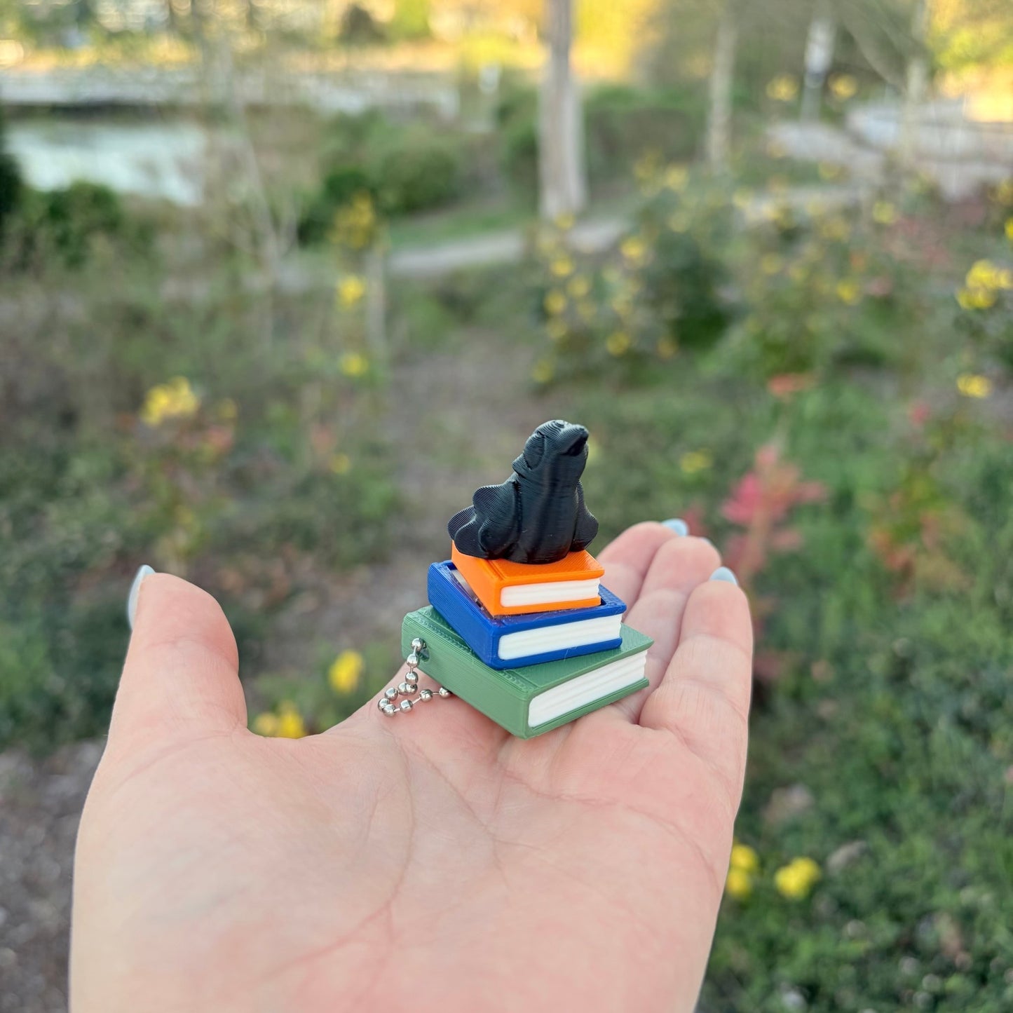 Ravenhood Inspired Book Stack Fidget Clicker Keychain - Awfullynerdy.co