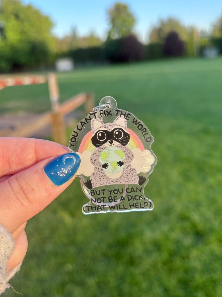 You Can't Fix the World Raccoon Keychain - Awfullynerdy.co