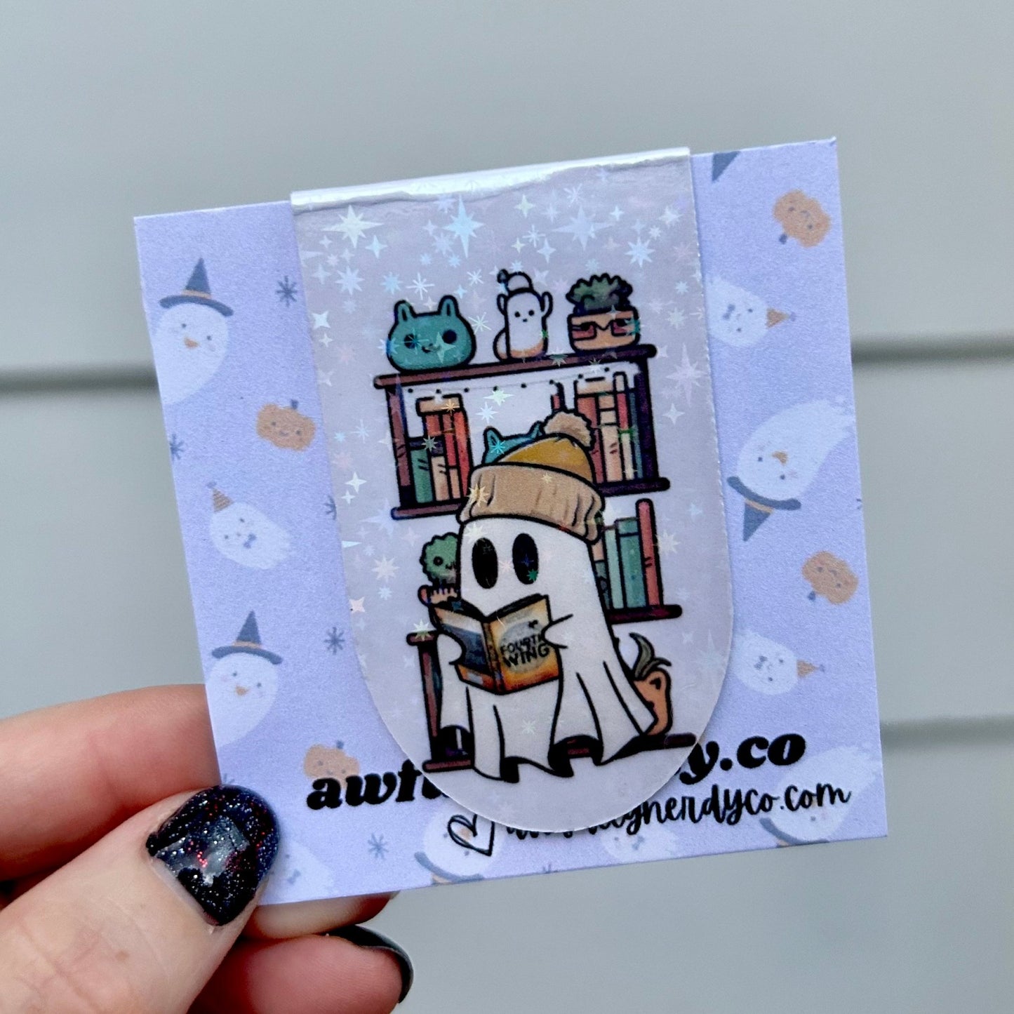 Ghost Reading Fourth Wing by a Bookshelf Magnetic Bookmark - Awfullynerdy.co